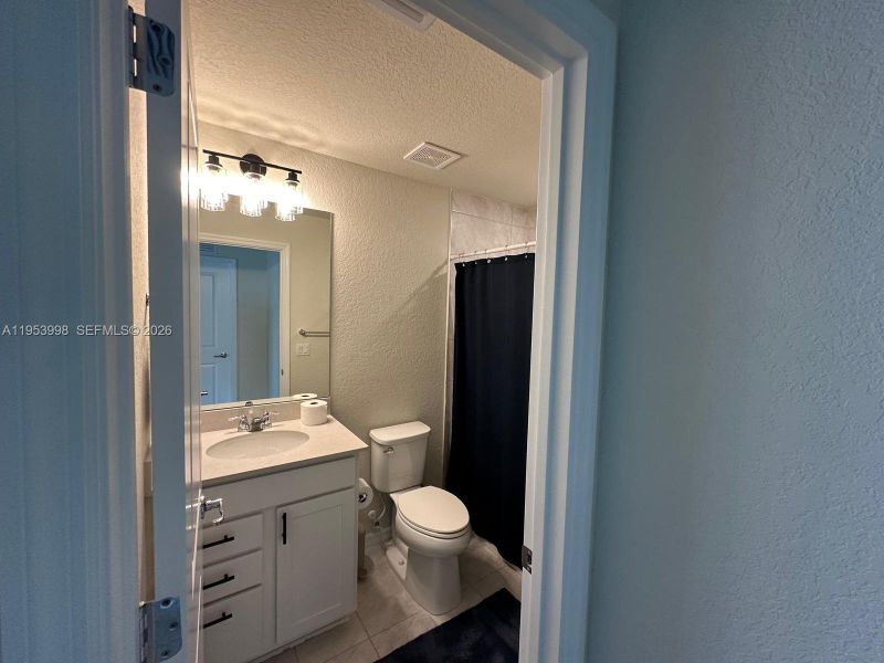Furnished interior view inside a new home in , Lauderdale Lakes (Image 8).