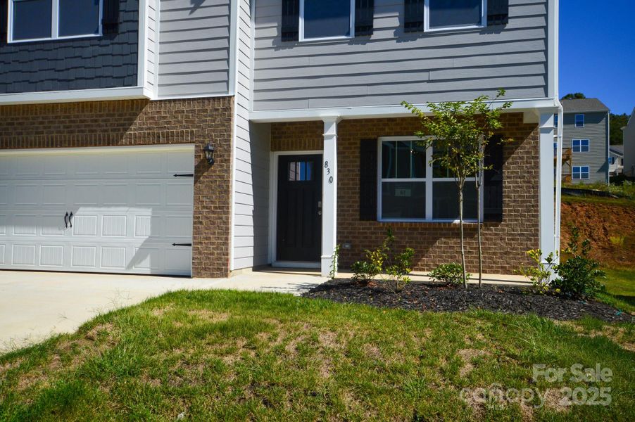 Exterior details and patio area of a home in Rydele Heights, Asheville (Image 3). Exterior details and patio area of a home in Rydele Heights, Asheville (Image 3).