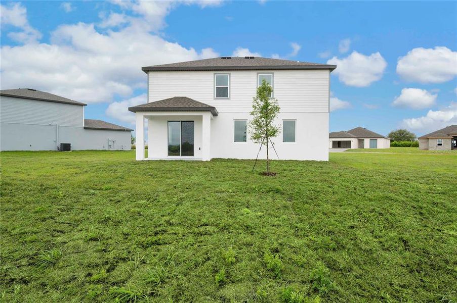 Exterior details and patio area of a home in Citrus Place, Babson Park (Image 3).