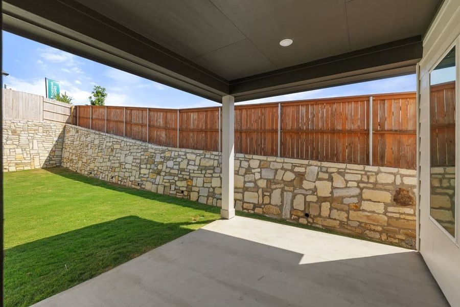 Exterior details and patio area of a home in Lariat, Liberty Hill (Image 4). Exterior details and patio area of a home in Lariat, Liberty Hill (Image 4).