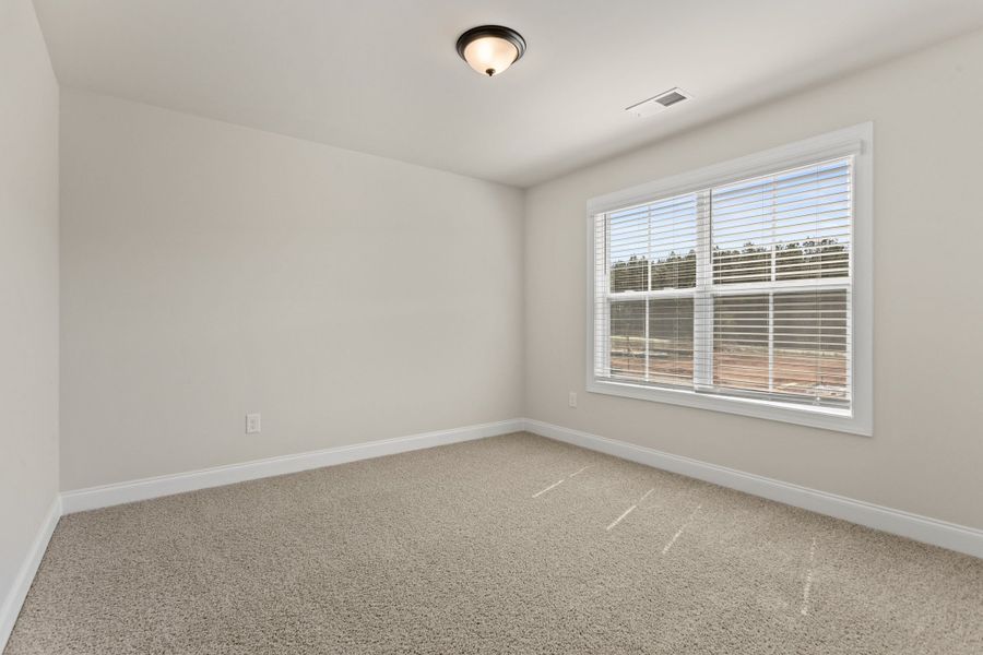 Spacious, unfurnished interior of a new home in Cherokee Knoll, Williamston (Image 22).