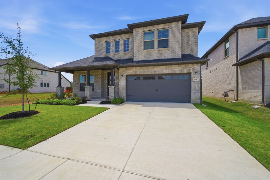 Front exterior of a new home in La Terra, Celina, TX, highlighting curb appeal (Image 26).