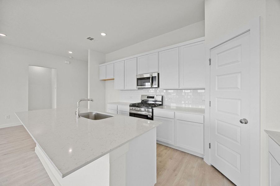 Furnished interior view inside a new home in Prairie Winds, Hutto (Image 5).
