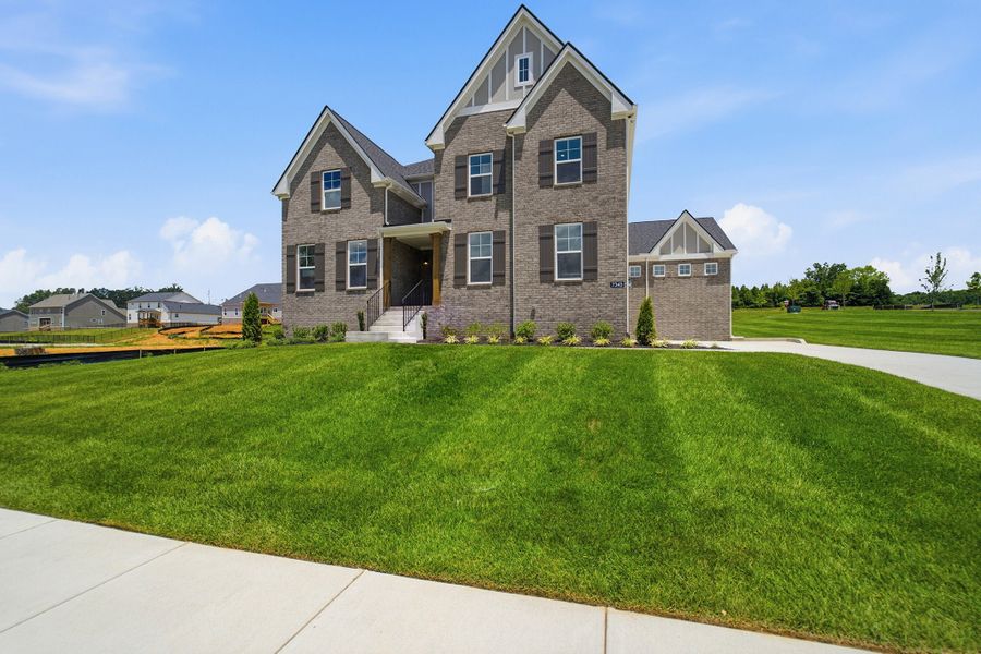 Front exterior of a new home in Aden Woods, Fairview, TN, highlighting curb appeal (Image 27).