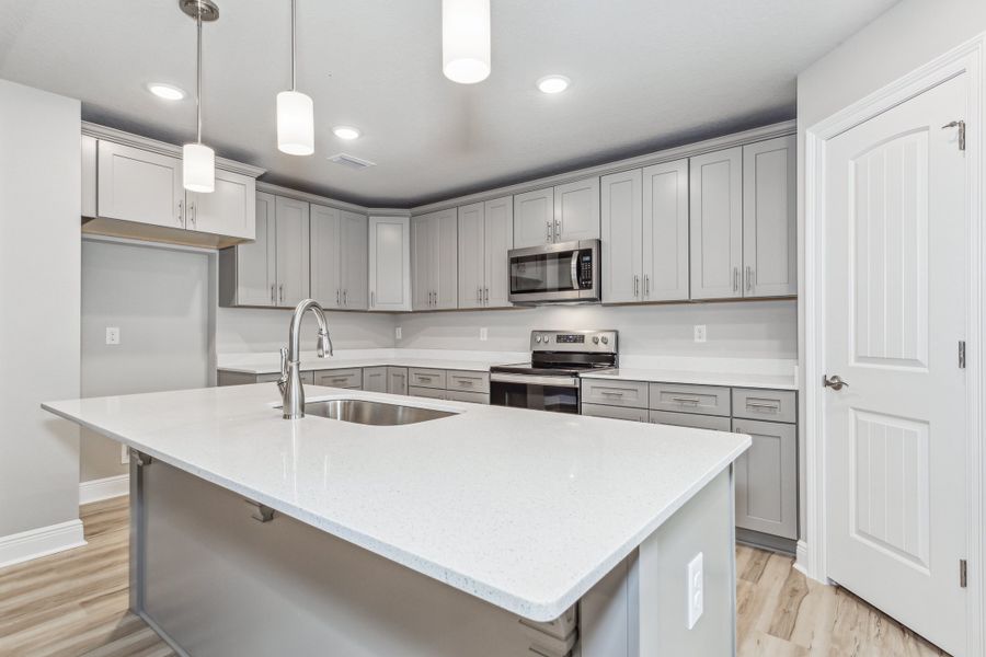 Representative furnished interior of a home built from the The Liberty by Herbst Homes in Clear Water Landing, Milton (Image 8).