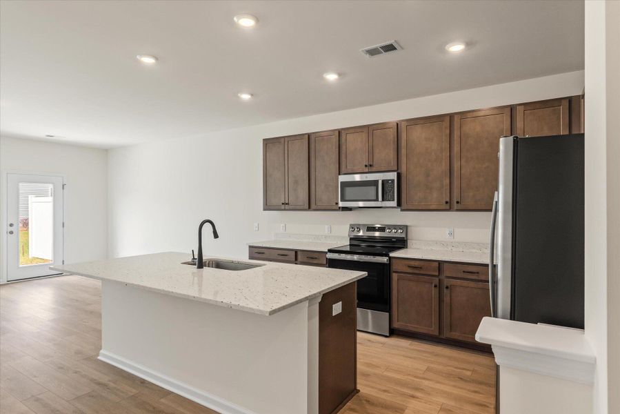 Furnished interior view inside a new home in The Landings at Montague, Goose Creek (Image 9).