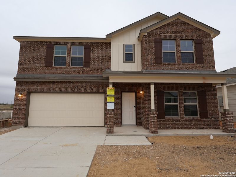 Front exterior of a new home in Paloma Park, Converse, TX, highlighting curb appeal (Image 25). Front exterior of a new home in Paloma Park, Converse, TX, highlighting curb appeal (Image 25).