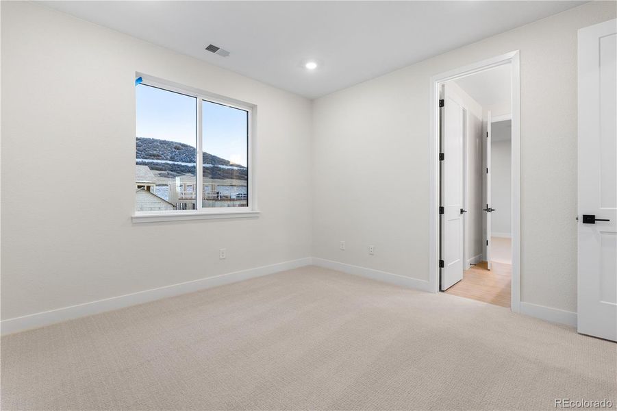 Spacious, unfurnished interior of a new home in Autograph at Lyric, Lone Tree (Image 38).