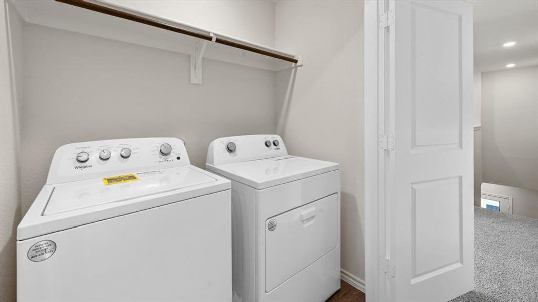 Laundry room featuring washer and clothes dryer, carpet, and recessed lighting