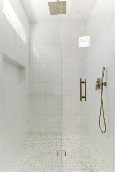 Bathroom with tiled shower