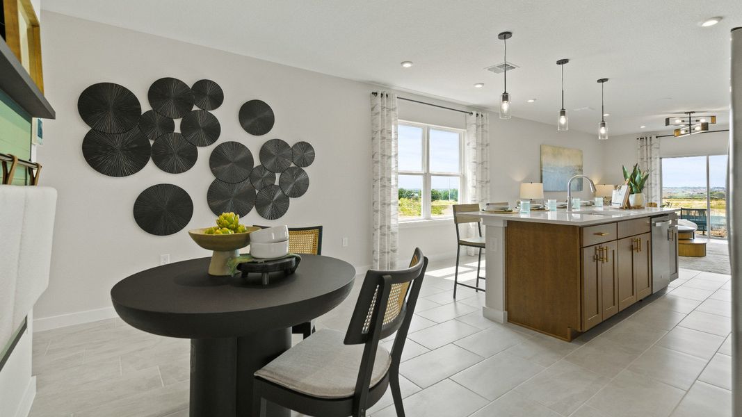 Open-concept layout connects the front flex space to the modern kitchen—ideal for daily living and entertaining.