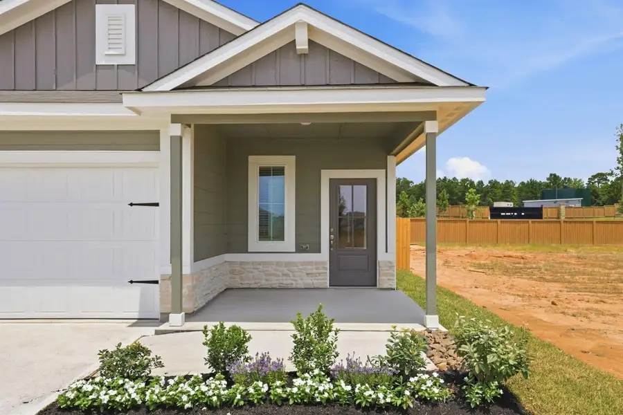 Exterior details and patio area of a home in Magnolia Woods, Magnolia (Image 2). Exterior details and patio area of a home in Magnolia Woods, Magnolia (Image 2).