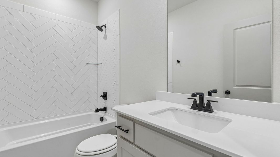 Representative furnished interior of a home built from the Toulouse II by Normandy Homes in Rainwater Crossing, Celina (Image 5).