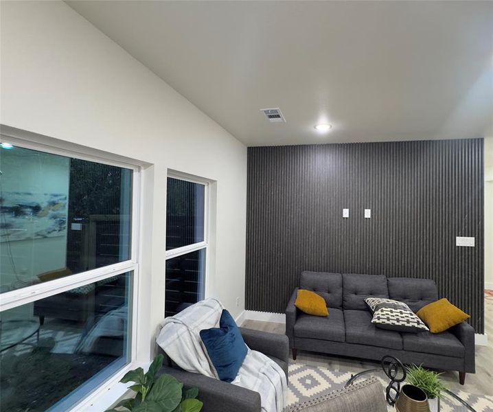 Living room featuring light hardwood / wood-style flooring