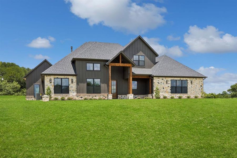 Front exterior of a new home in RangeWood, Weatherford, TX, highlighting curb appeal (Image 27). Front exterior of a new home in RangeWood, Weatherford, TX, highlighting curb appeal (Image 27).