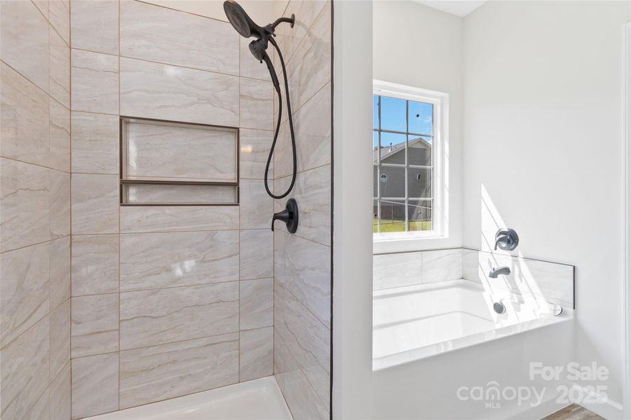 Primary ensuite shower and soaker tub Primary ensuite shower and soaker tub