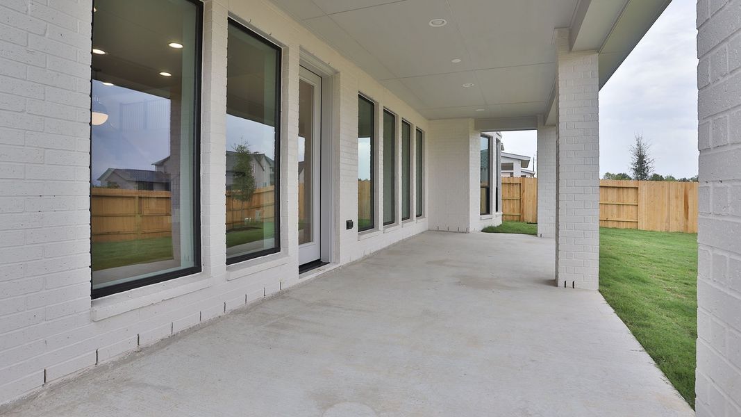 Exterior details and patio area of a home in Lakes of Cane Island, Katy (Image 2). Exterior details and patio area of a home in Lakes of Cane Island, Katy (Image 2).