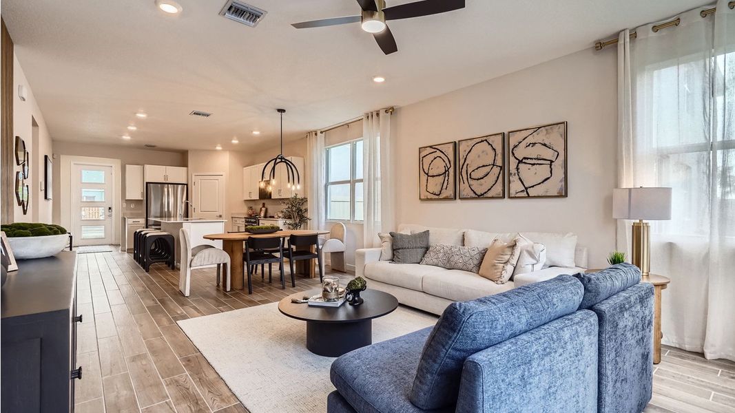 Representative furnished interior of a home built from the Grandcourt by D.R. Horton in Parker Pointe, Homestead (Image 5).