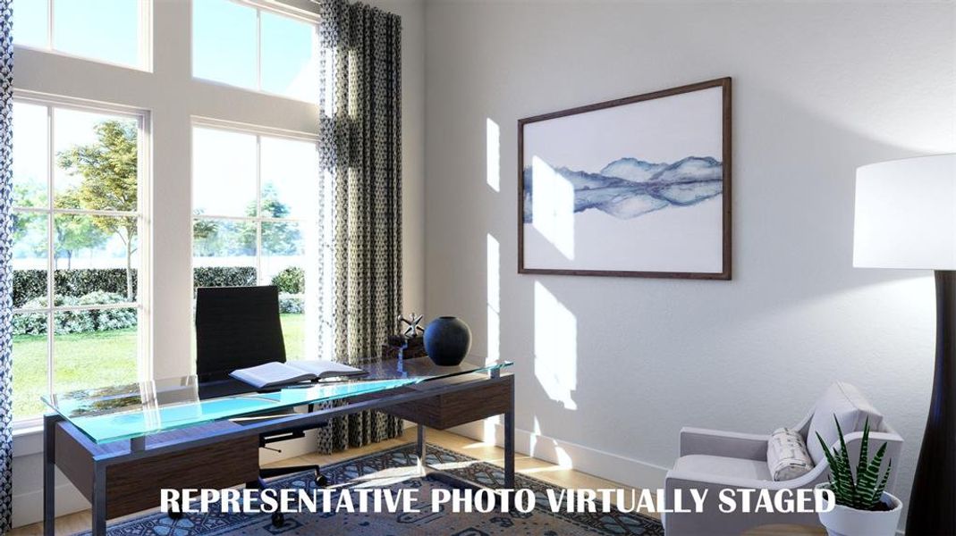 Your new dream office is located at the front of this beautiful home and offers privacy for those needing to work from home.  REPRESENTATIVE PHOTO VIRTUALLY STAGED