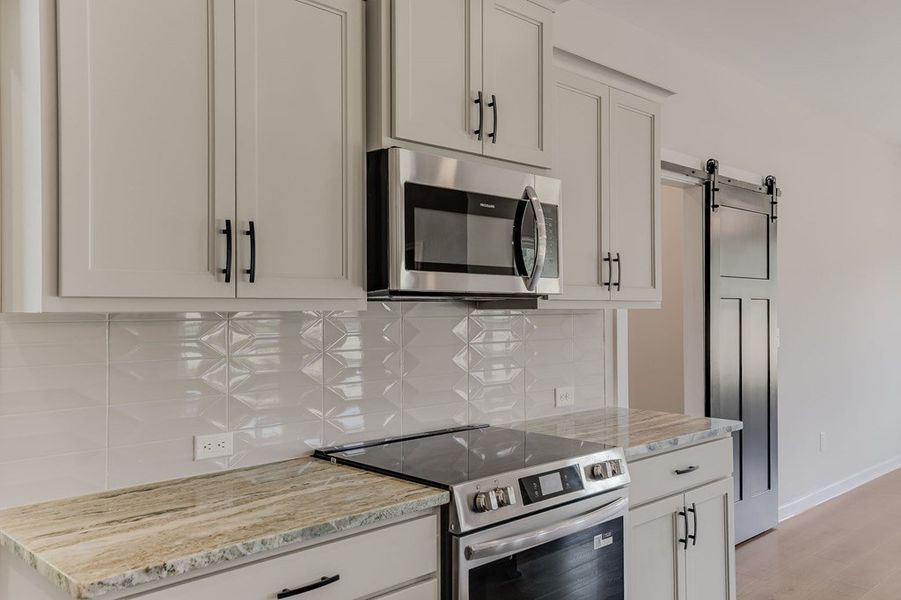 Furnished interior view inside a new home in LOVVORN ESTATES, Carrollton (Image 11).