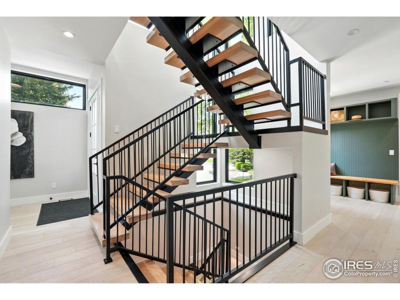 Custom white oak and steel floating staircase Custom white oak and steel floating staircase