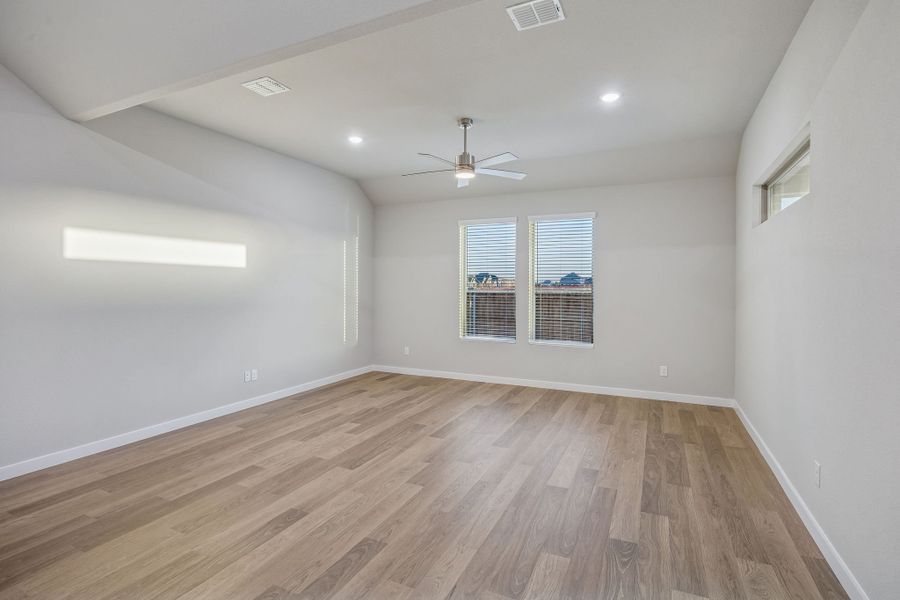 Living Room in the Wimbledon home plan by Trophy Signature Homes – REPRESENTATIVE PHOTO