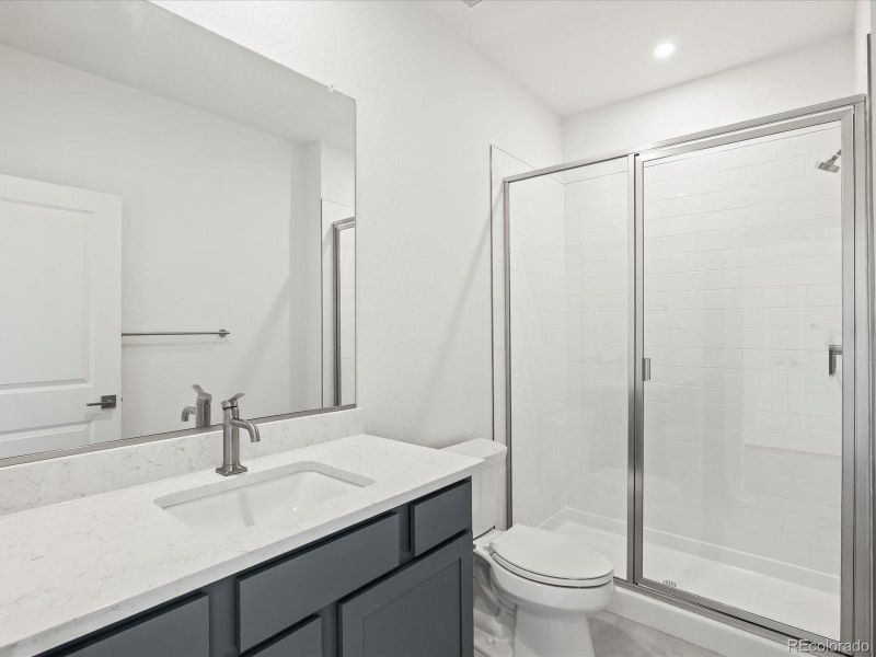 Furnished interior view inside a new home in Ascent at Inverness, Englewood (Image 7).