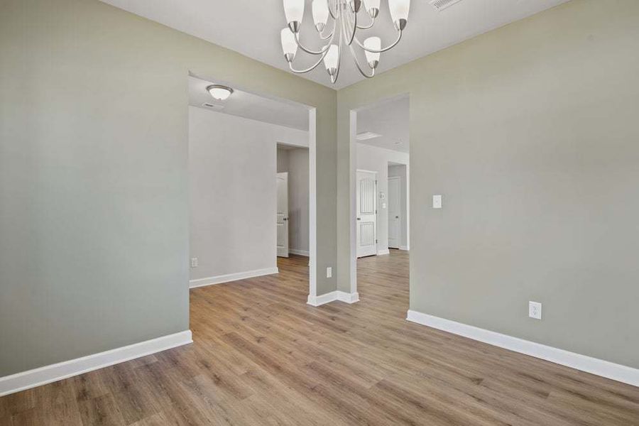Representative unfurnished interior of a home built from the Camellia by Caviness & Cates Communities in Bartlett Manor, Youngsville (Image 40).
