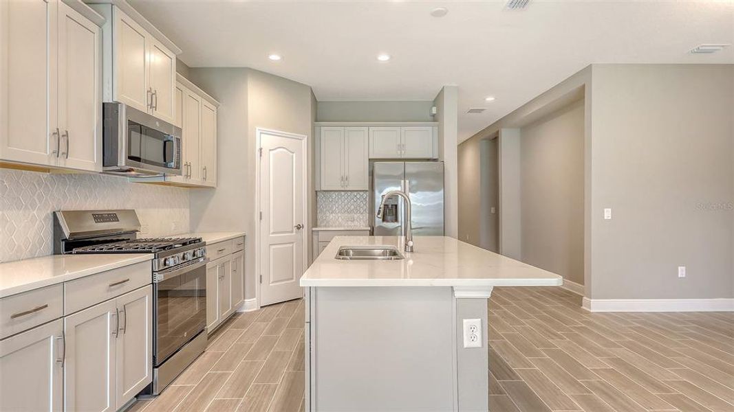 Furnished interior view inside a new home in Wildleaf, Parrish (Image 3).