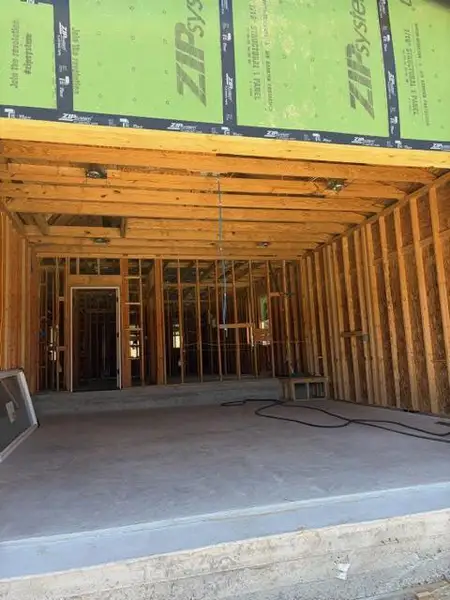 Witness the structural beginnings of a new home, showcasing meticulous framing and foundational construction. Witness the structural beginnings of a new home, showcasing meticulous framing and foundational construction.