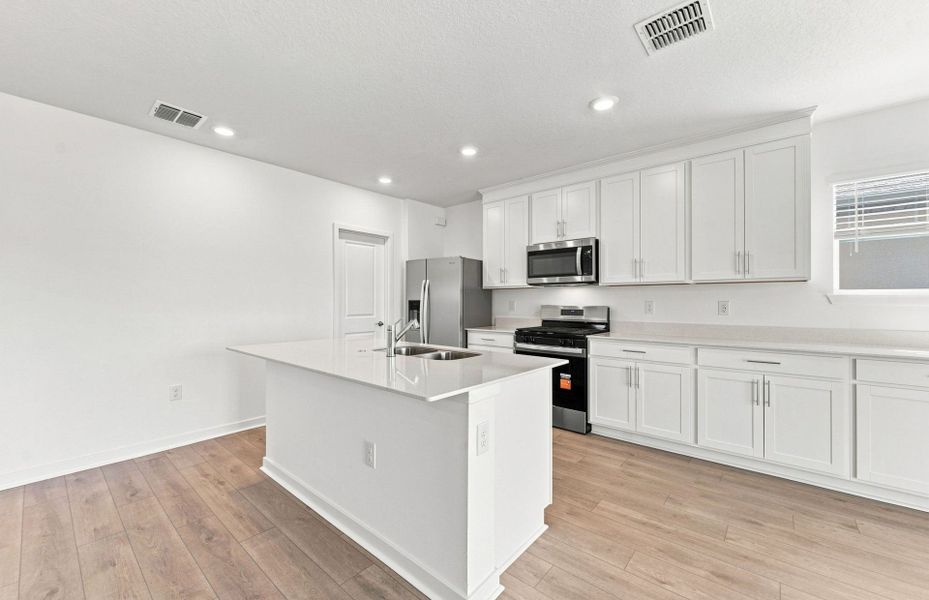 Furnished interior view inside a new home in Twisted Oaks, Wildwood (Image 11).