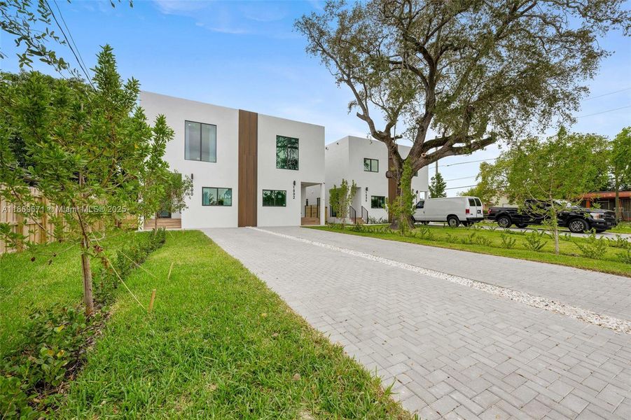 Front exterior of a new home in , Miami, FL, highlighting curb appeal (Image 18). Front exterior of a new home in , Miami, FL, highlighting curb appeal (Image 18).