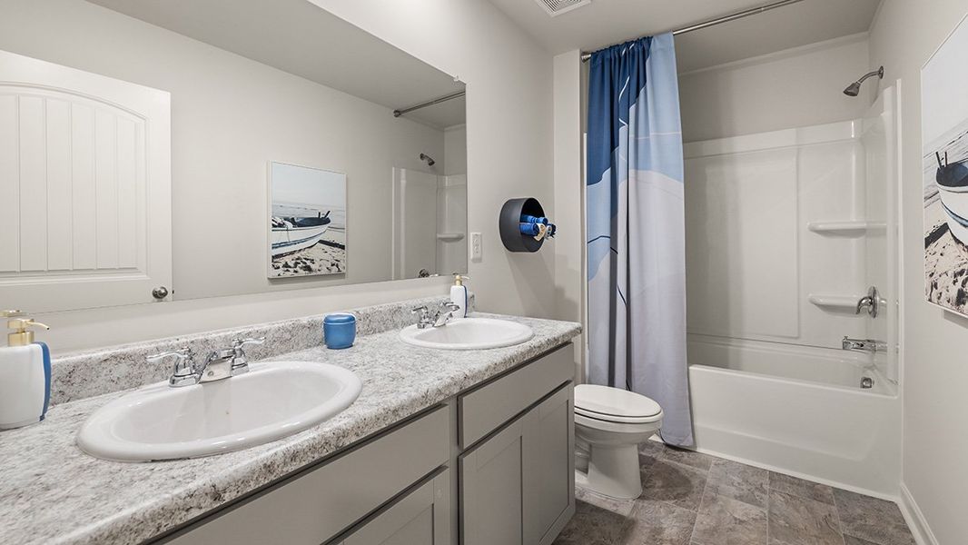Representative furnished interior of a home built from the ROBIE by D.R. Horton in Pointe Park, Union City (Image 43).