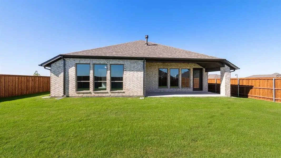 Exterior details and patio area of a home in Myrtle Creek 60', Waxahachie (Image 2).