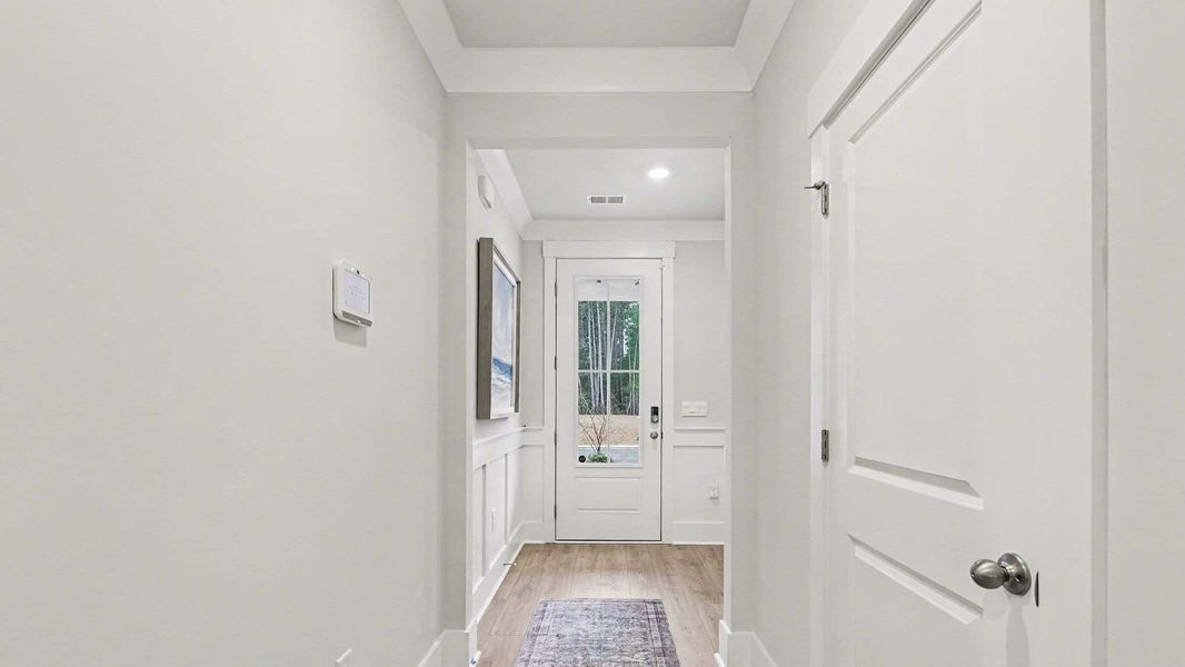 Spacious, unfurnished interior of a new home in Brunswick Plantation, Ash (Image 18).