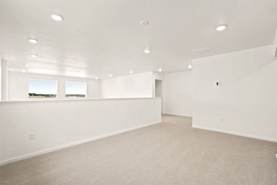 Spacious, unfurnished interior of a new home in Cordovan, Firestone (Image 15).