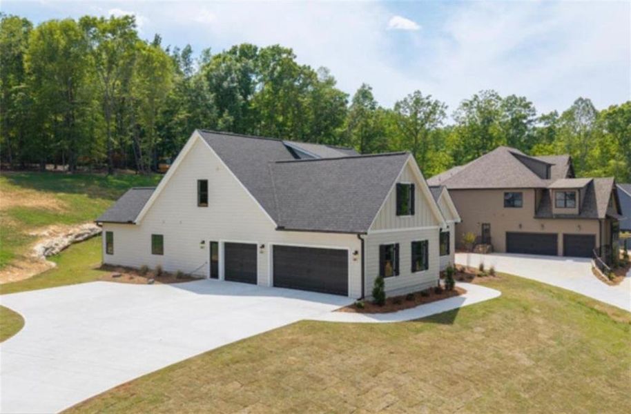 Front exterior of a new home in , Carrollton, GA, highlighting curb appeal (Image 17).