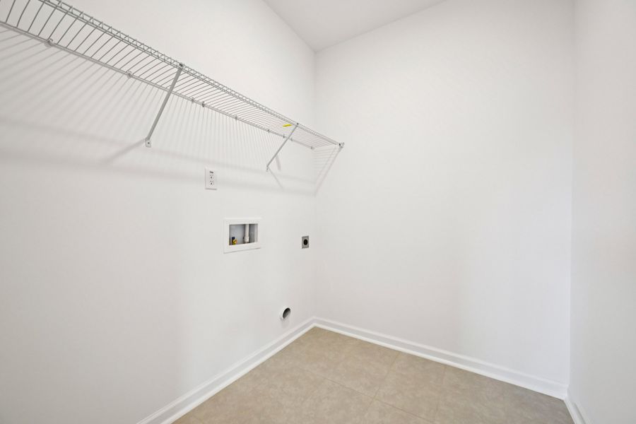 Representative unfurnished interior of a home built from the Macon by Ashton Woods in Rowland's Grant, Fuquay Varina (Image 48).