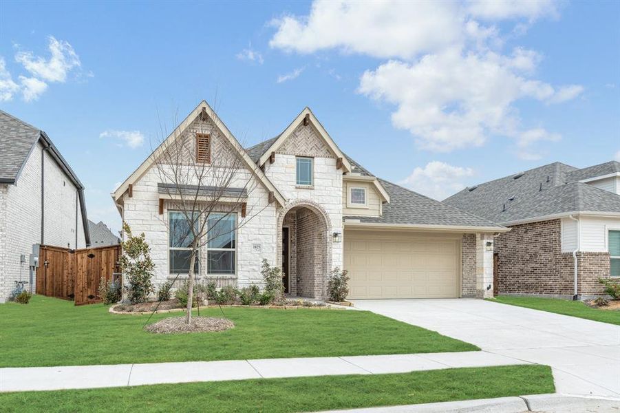 Front exterior of a new home in Waterscape, Royse City, TX, highlighting curb appeal (Image 26).