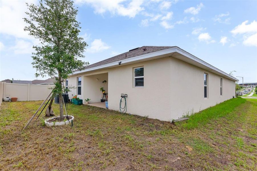 Front exterior of a new home in Citrus Landing, Davenport, FL, highlighting curb appeal (Image 21).