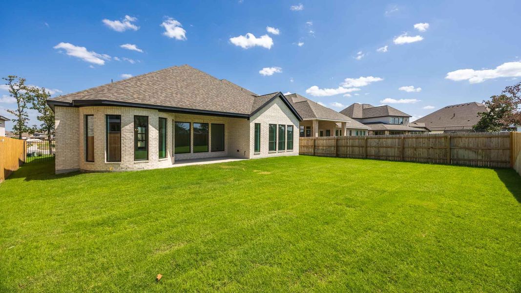Exterior details and patio area of a home in Santa Rita Ranch - Eldorado, Liberty Hill (Image 3).