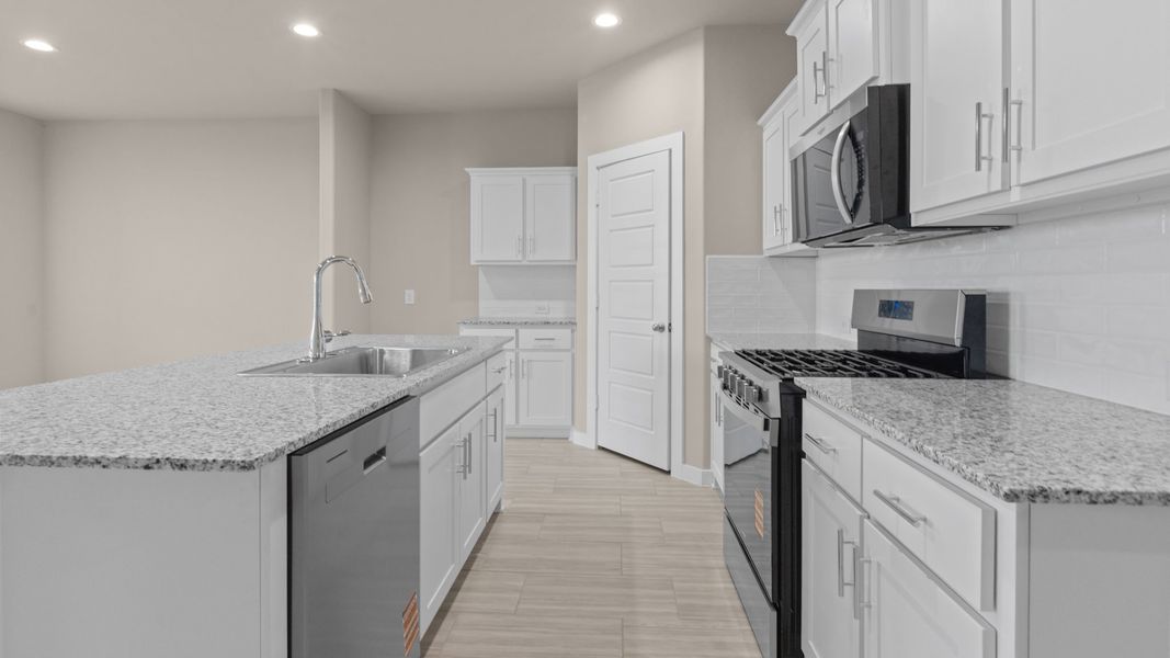 Representative furnished interior of a home built from the Cali by D.R. Horton in Legacy South, Midland (Image 6).