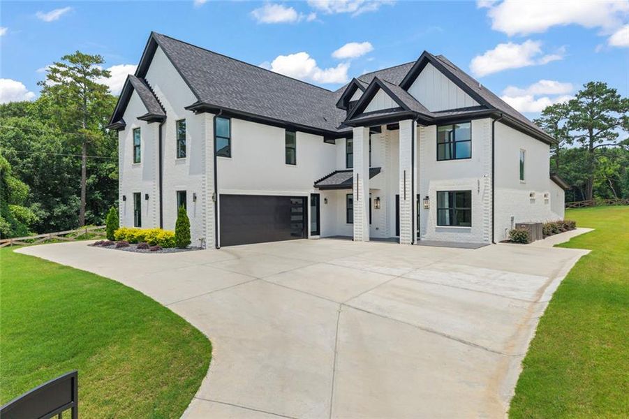 Front exterior of a new home in , Braselton, GA, highlighting curb appeal (Image 1). Front exterior of a new home in , Braselton, GA, highlighting curb appeal (Image 1).
