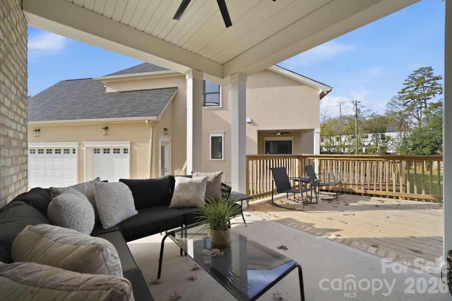 Deck and patio transition to yard — seamless indoor/outdoor flow. Deck and patio transition to yard — seamless indoor/outdoor flow.