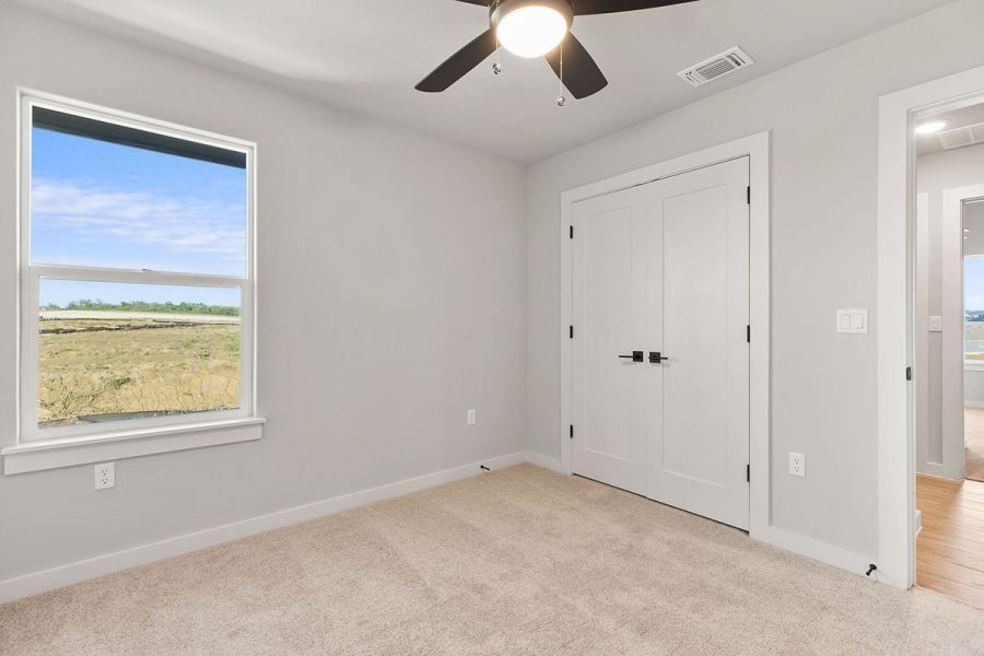 Spacious, unfurnished interior of a new home in Whisper Valley, Manor (Image 22). Spacious, unfurnished interior of a new home in Whisper Valley, Manor (Image 22).