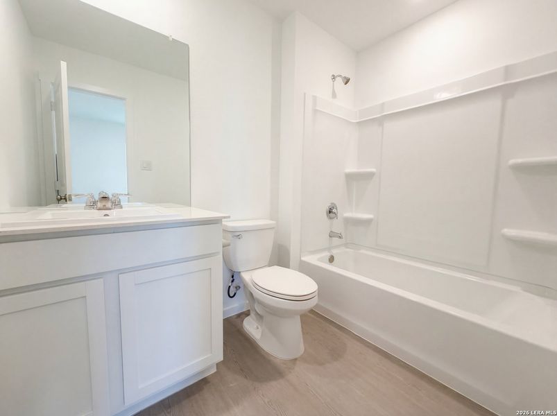 Furnished interior view inside a new home in Hunters Ranch, San Antonio (Image 7).