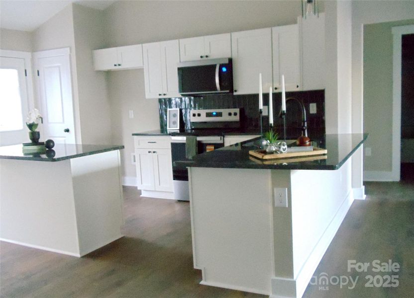 Furnished interior view inside a new home in , Mooresville (Image 6).