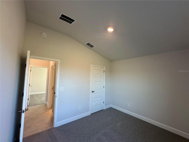 Spacious, unfurnished interior of a new home in Densan Park, Wildwood (Image 22).