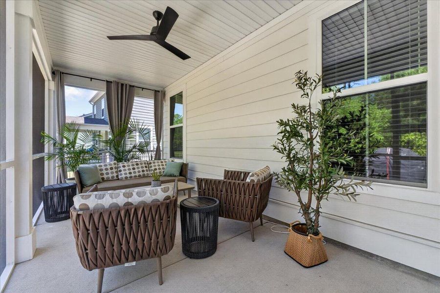 Exterior details and patio area of a home in Tidewater at Lakes of Cane Bay, Summerville (Image 25).