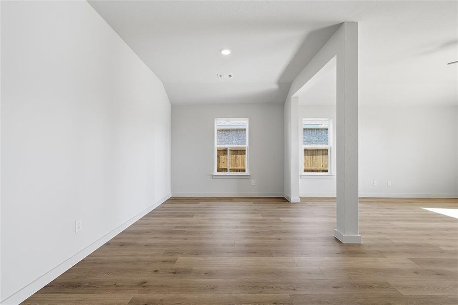 Unfurnished room with light wood-style floors and recessed lighting